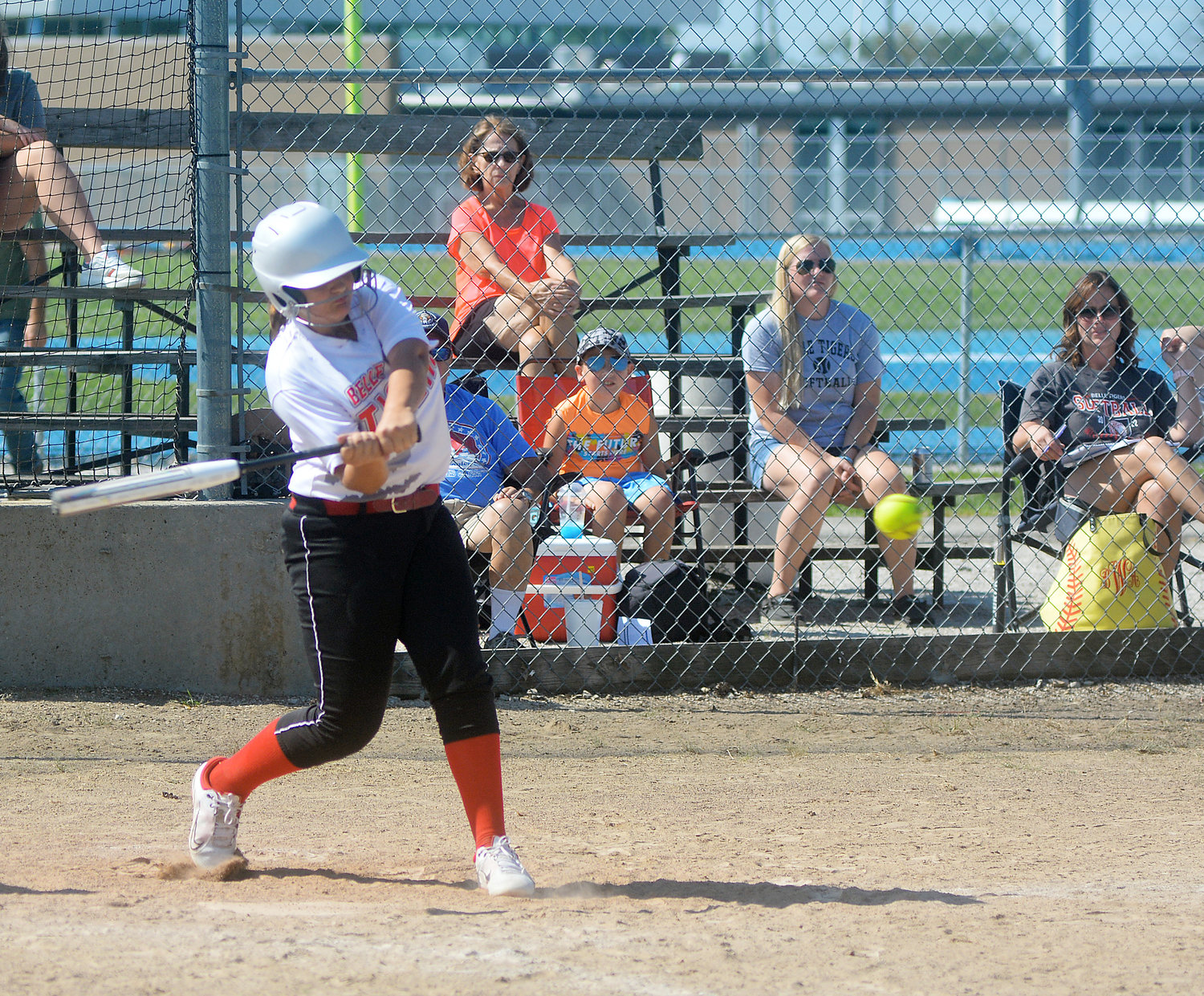 Dakota Butcher swings at a pitch for Belle Lady Tiger softball at the Montgomery County Fall Softball Classic Saturday along Highway 19. Butcher scored two runs as part of Belle’s 15-0 victory over St. Clair’s Lady Bulldogs in their tournament opener.